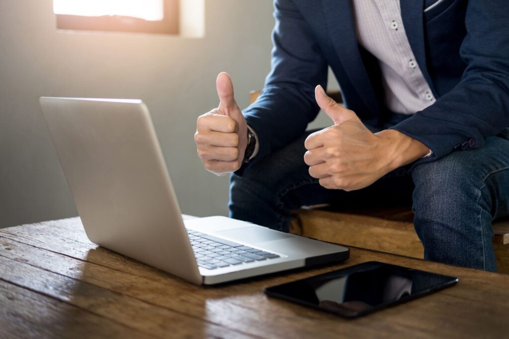 business man showing thumb up