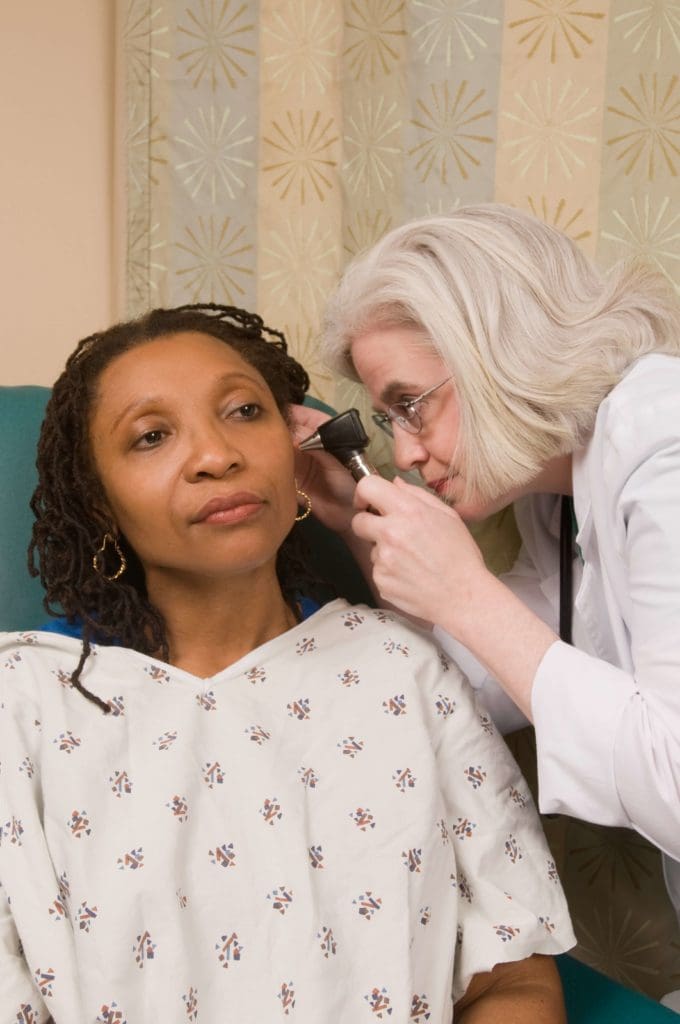 doctor-checking-patients-ear