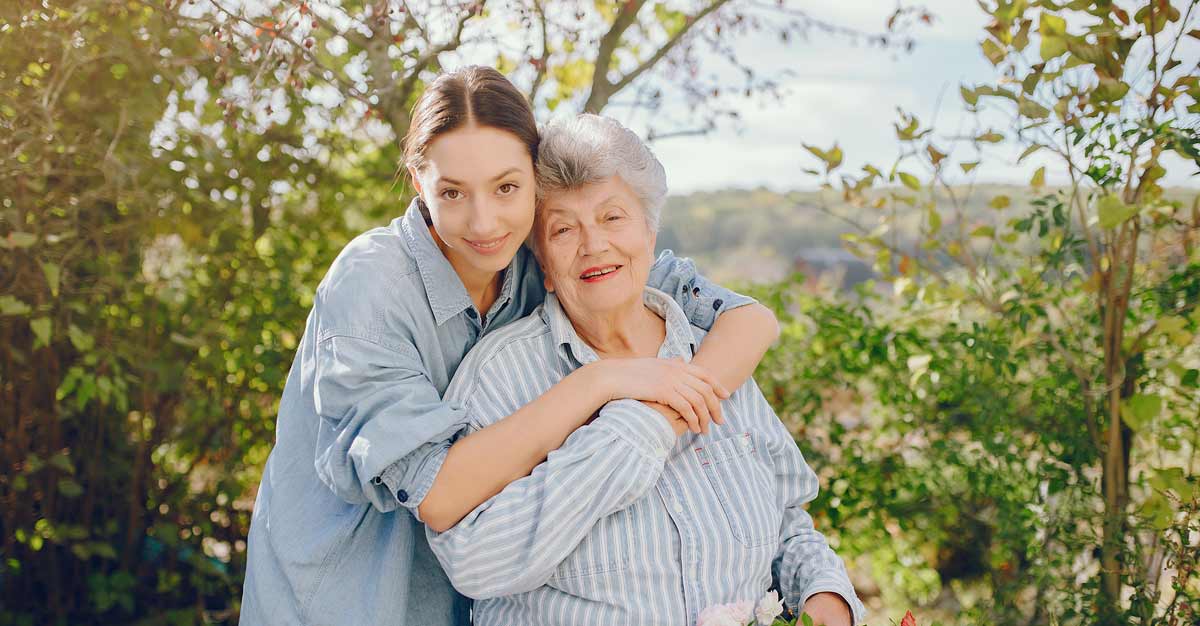 grandmother with young granddaughter caregiver
