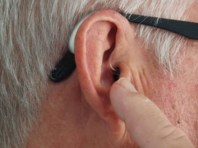 man with hearing aids