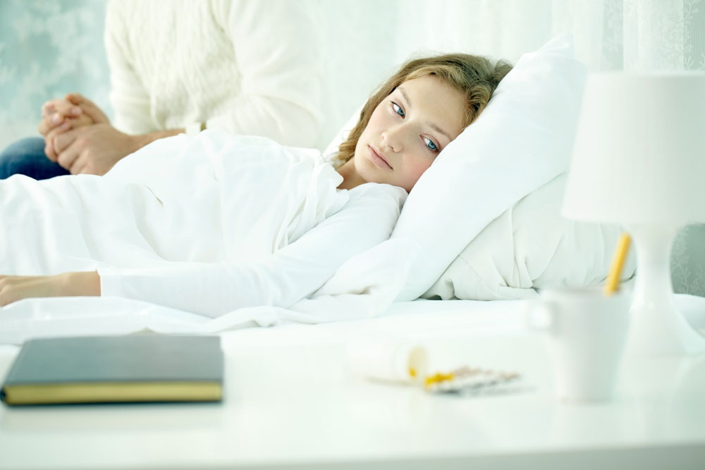 sick-spouse-lying-in-bed