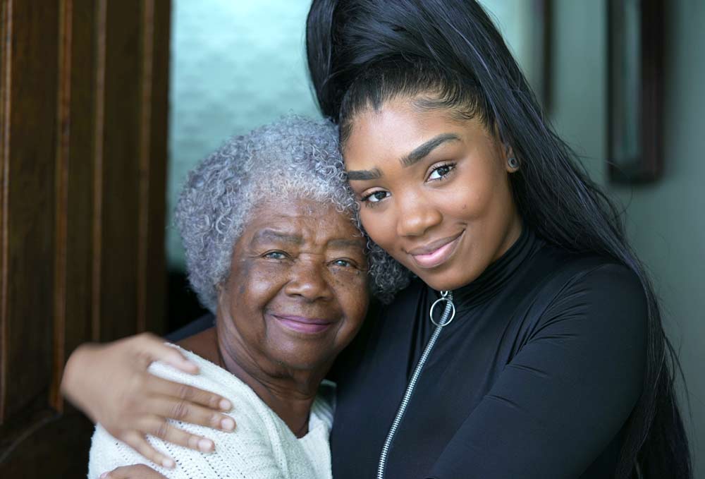 granddaughter caregiver holding