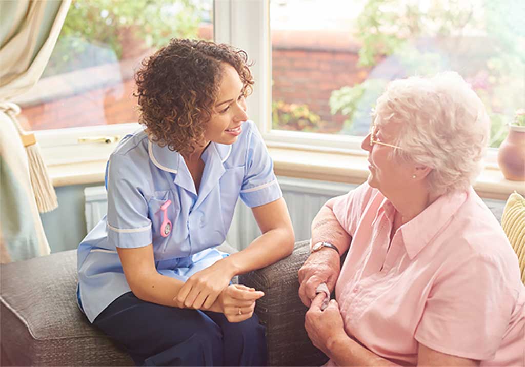 hha caregiver with elderly woman